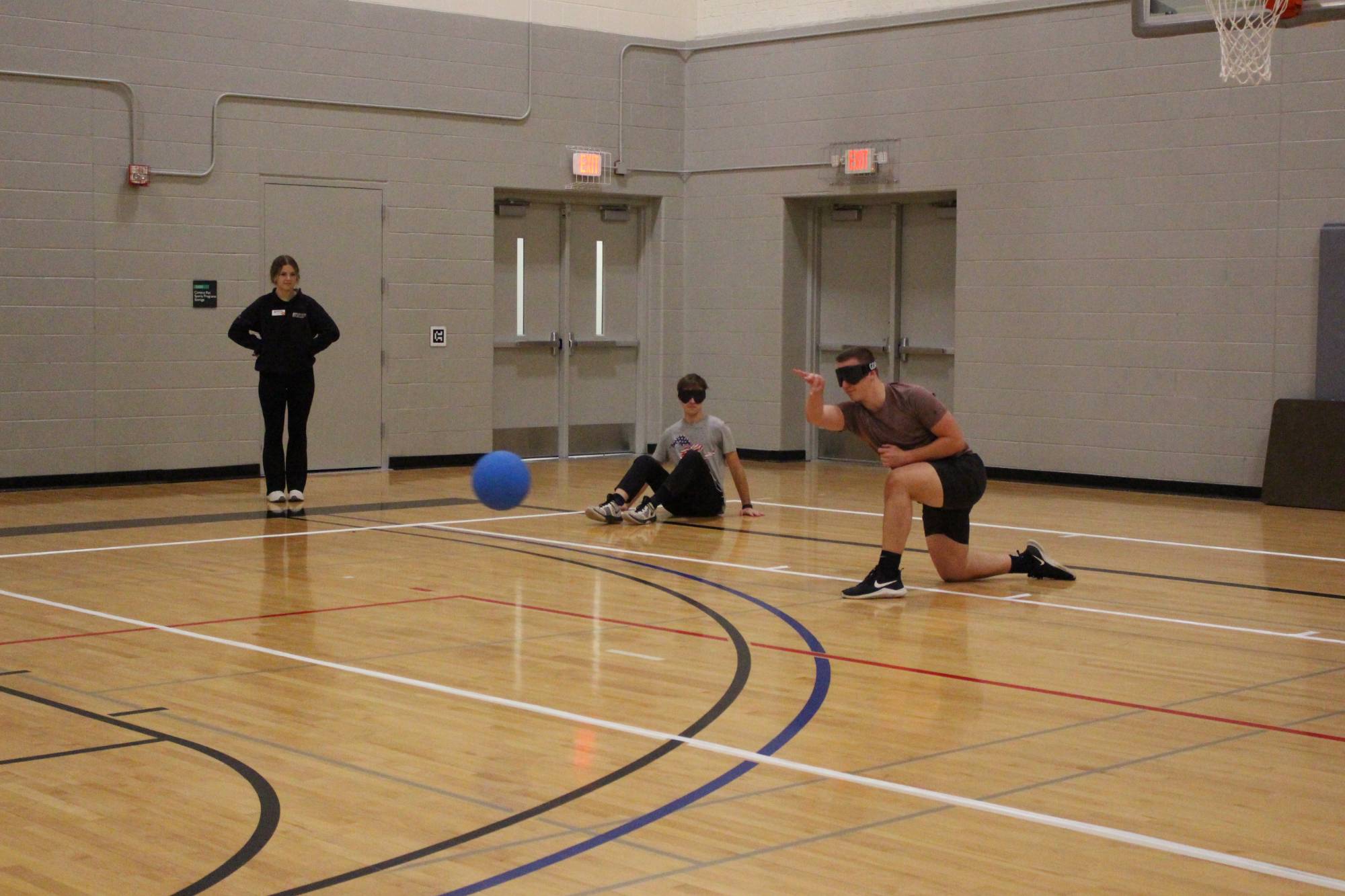 Student playing goalball at an adaptive intramural sports event